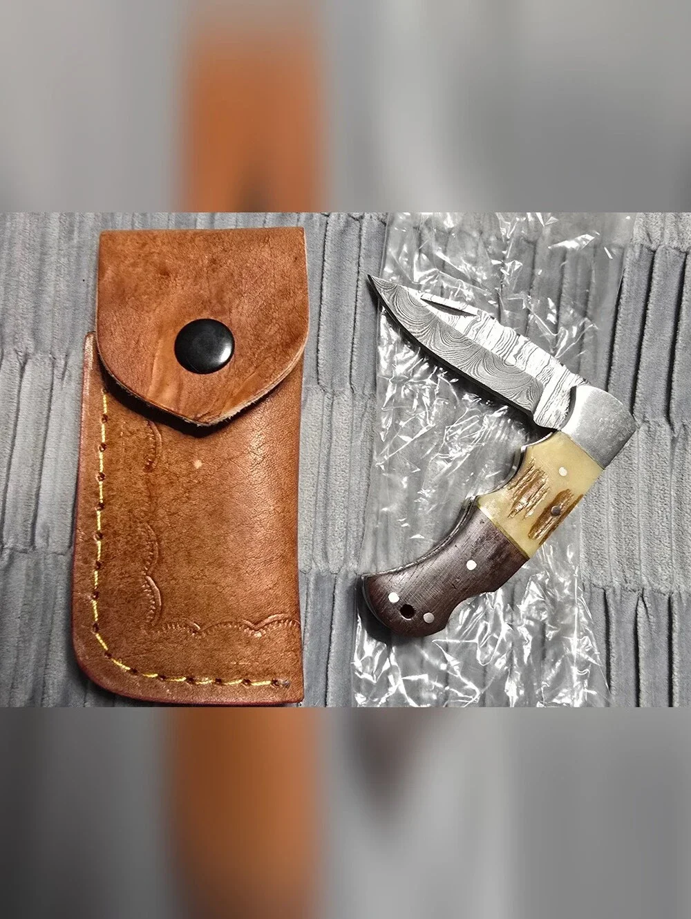 Custom Damascus Folding Knife with Tan Leather Sheath